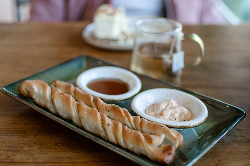 Garlic Bread Sticks with dipping sauce at Marcos